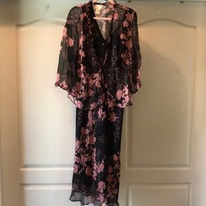 Chiffon dress with jacket with beading on jacket.